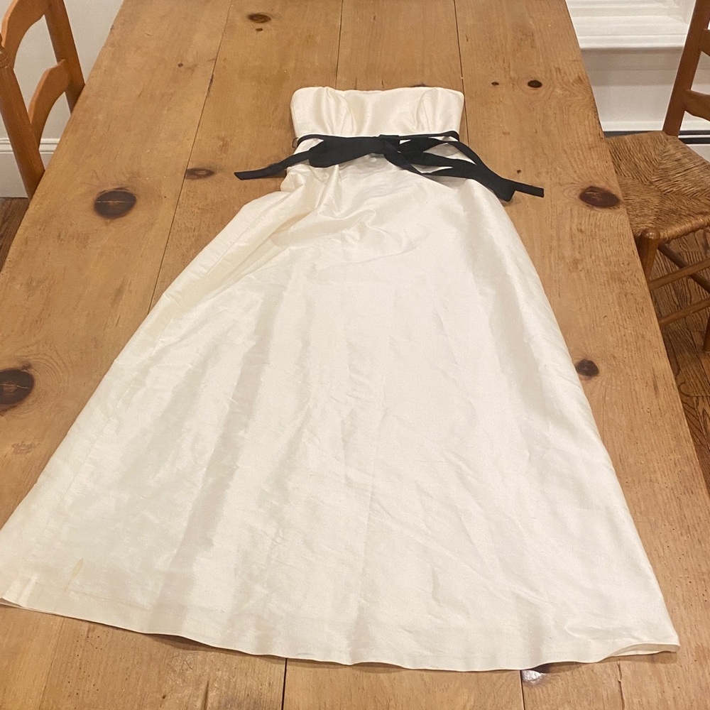 Serafina Elegant White Strapless Dress with Black Bow